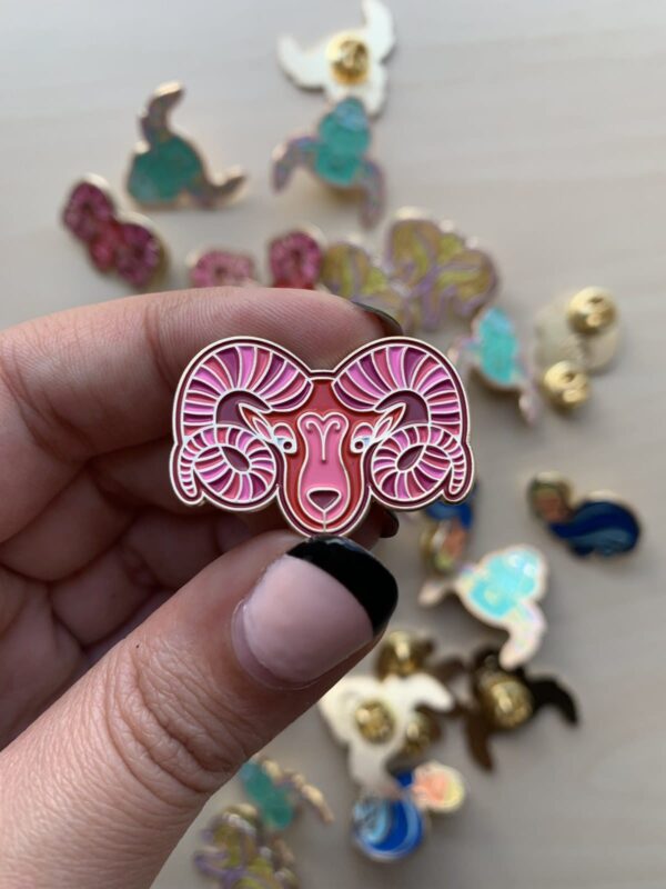 Aries Pin in red with gold enamel.