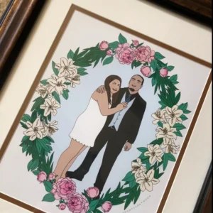 Custom wedding portrait surrounded by flowers and smiling couple.