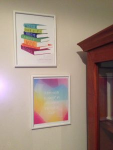Colorful and happy prints of books and quotes on wall