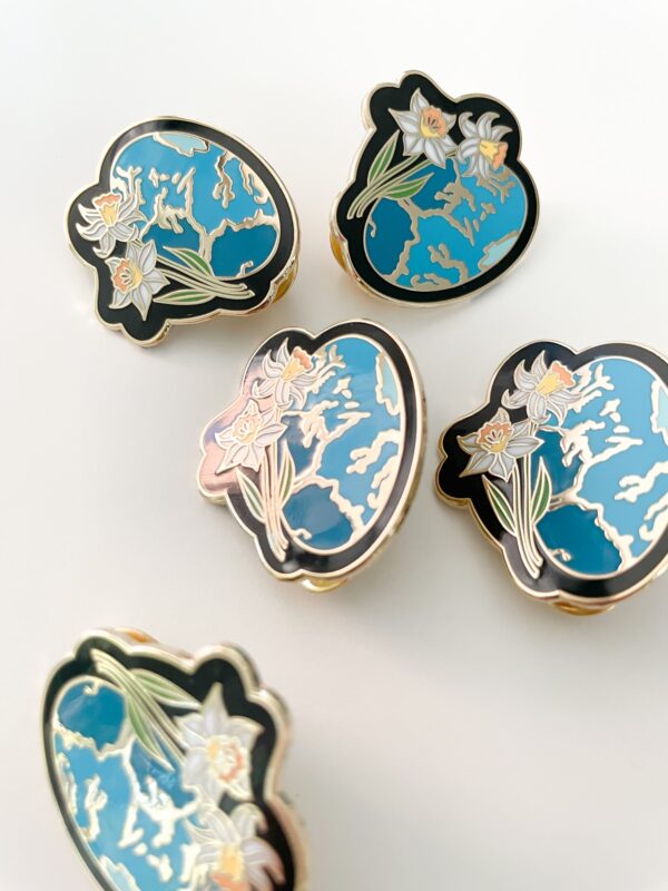 Turquoise and Narcissus pin in gold enamel. December month pin.