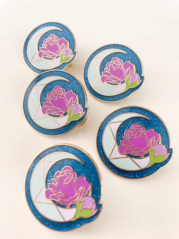 Moonstone and pink Rose birth pin with glittery blue backing on gold enamel. June month pin.