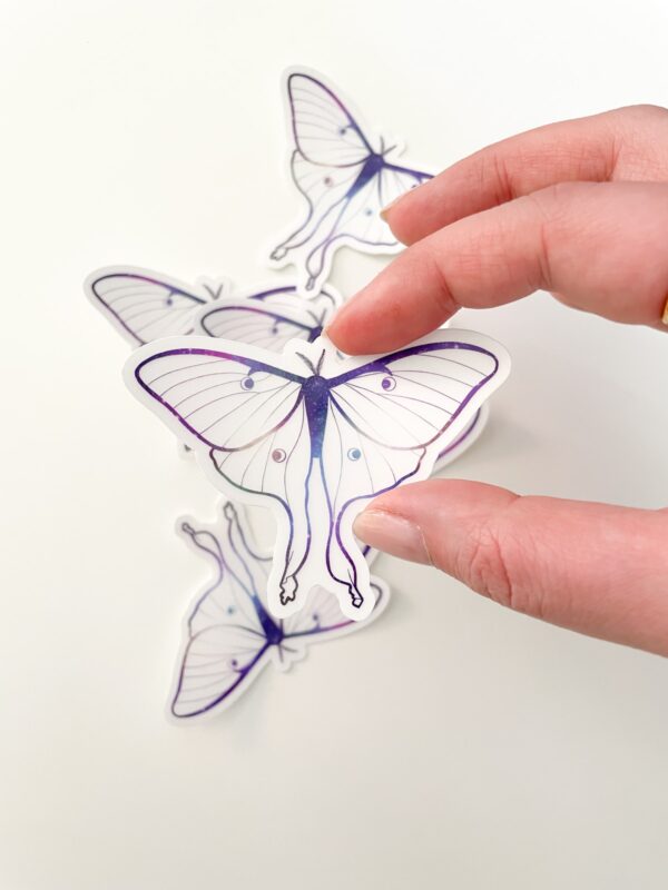 Luna Moth clear stickers by Astraluna Arts.