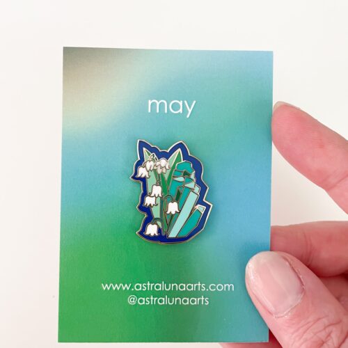 May birth month pin with emerald stone and lily of the valley flower, set in gold enamel. by Astraluna Arts.