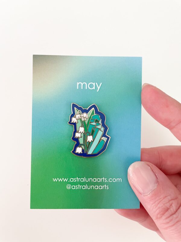 May birth month pin with emerald stone and lily of the valley flower, set in gold enamel. by Astraluna Arts.