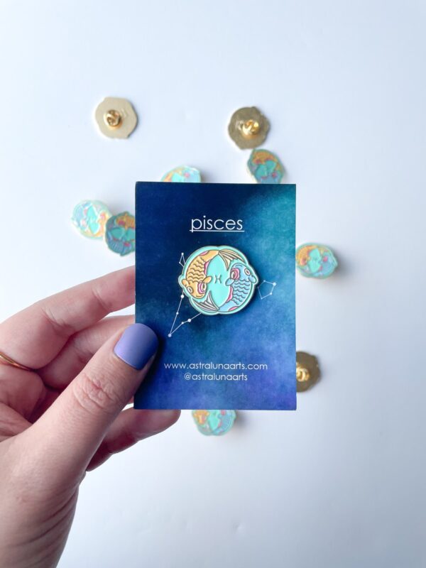 Pisces pin with astrology backing.