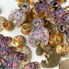 Scorpio pin with bright pink and purple with black. Gold enamel scorpio pins