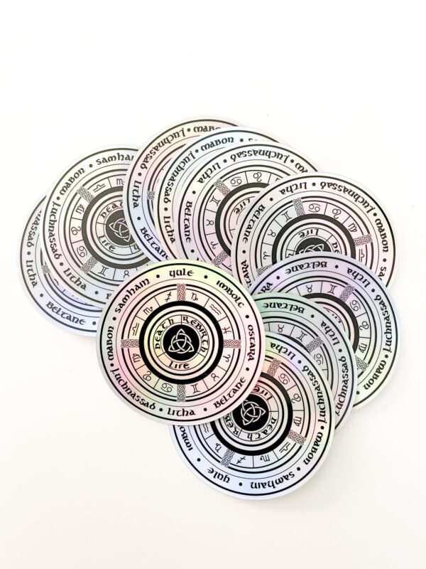 Stack of Wiccan Wheel Sticker with iridescence by Astraluna Arts