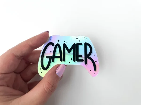 Holographic Gamer Sticker in hand